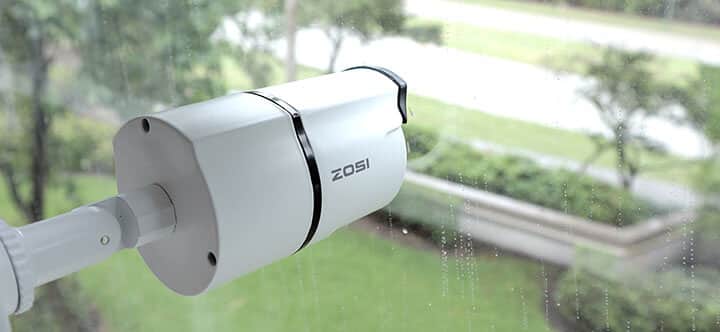 Security camera installed behind glass